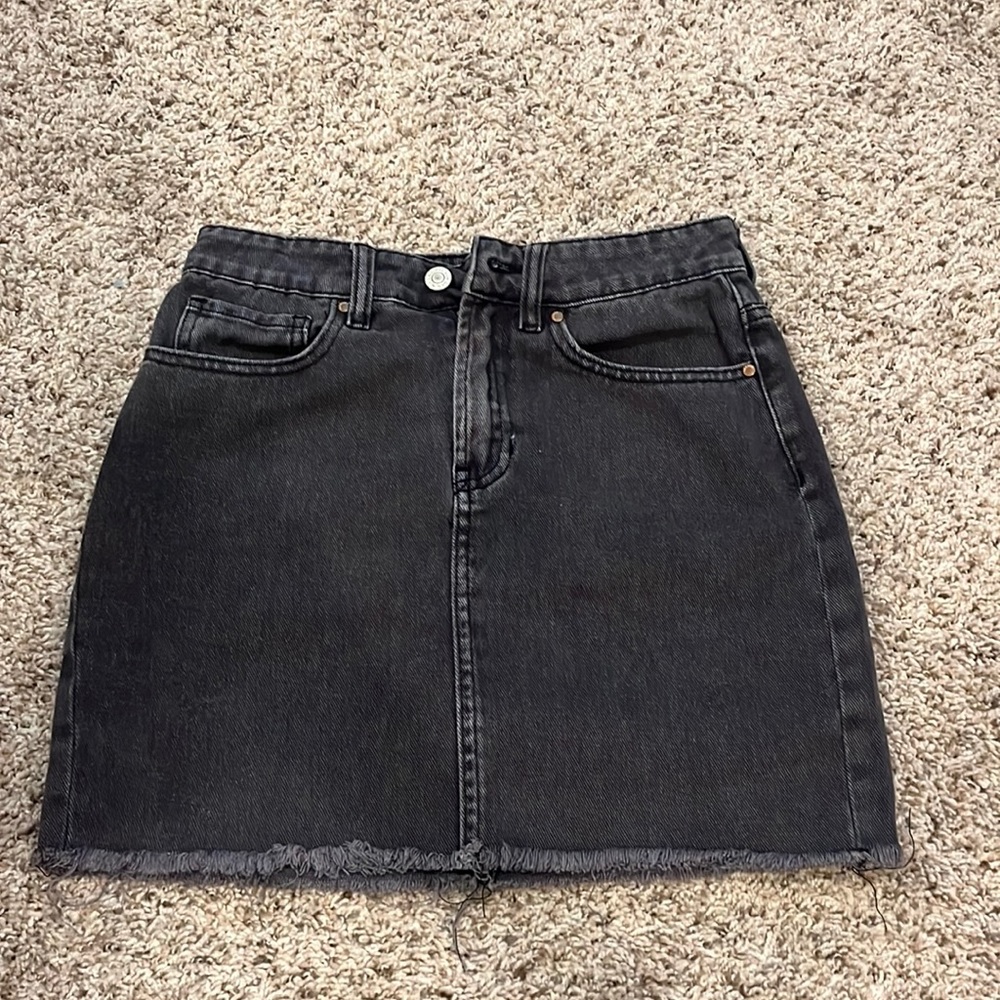 Raw hem black denim skirt